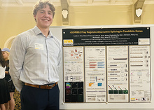 Summer Scholar Kaleb Feia with his poster at the 2025 Summer Undergraduate Research Conference