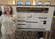 Summer Scholar Ellie Wojcikowski with her poster at the 2025 Summer Undergraduate Research Conference